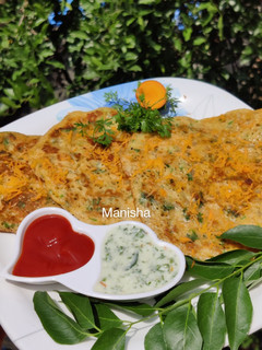 A picture of Sooji Uttapam (Savory Semolina & Maize Pancakes).