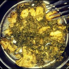 A picture of Palak Chicken with Stuffed Green Chutney.