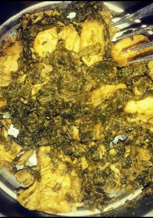 A picture of Palak Chicken with Stuffed Green Chutney.
