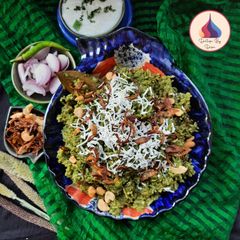 A picture of Palak Paneer Biryani.