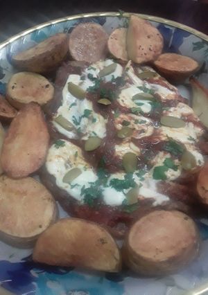 Una foto de Matambrito a la pizza con papas