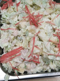 A picture of Apple salad with chicken cabbage.
