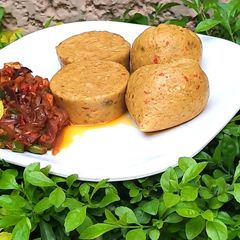 A picture of Alalan dankali with onion sauce.