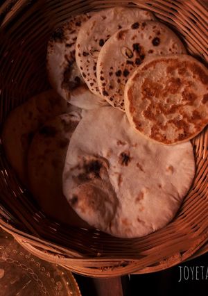 A picture of Cheesy kulcha on tawa.