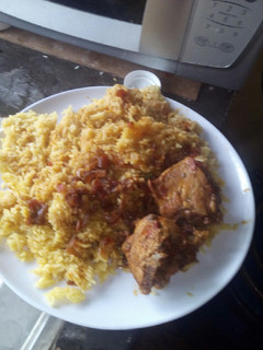 A picture of Tumeric rice And chicken stew.