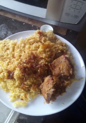 A picture of Tumeric rice And chicken stew.