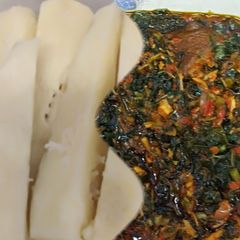 A picture of Yam and vegetable sauce.