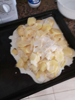Una foto de Papas al horno con queso y nata