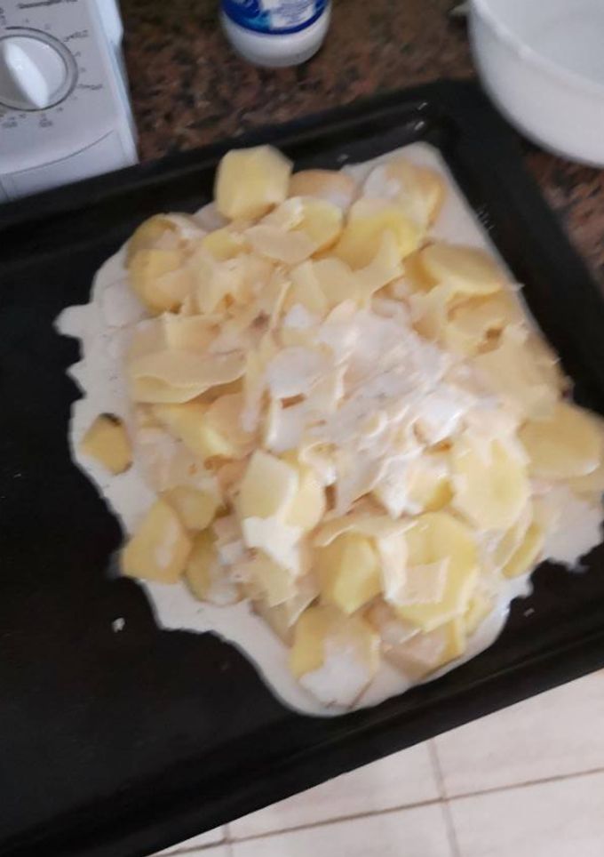 Una foto de Papas al horno con queso y nata