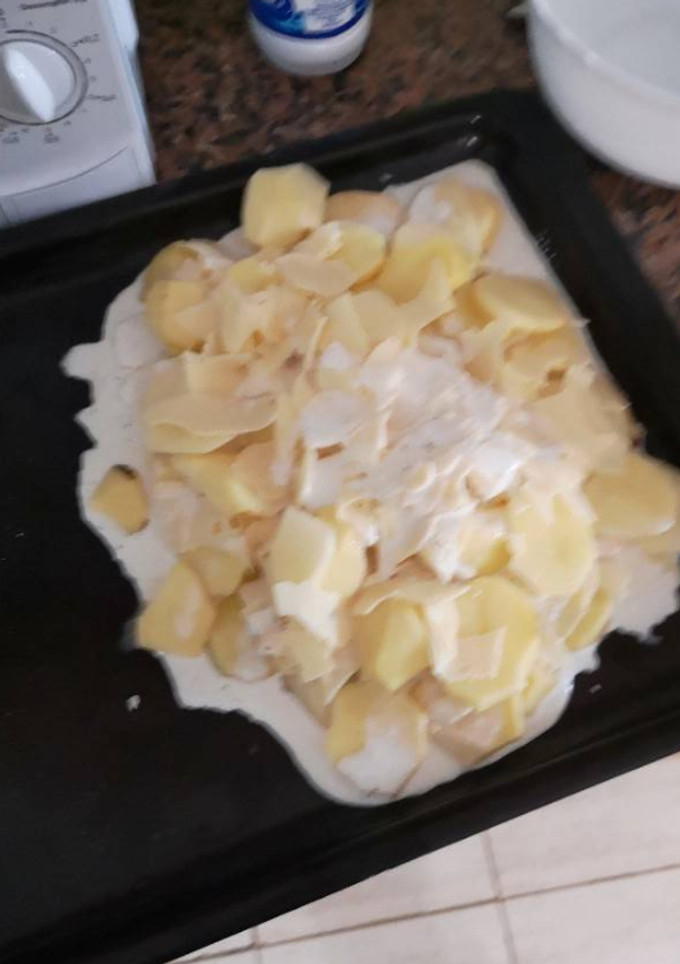 Una foto de Papas al horno con queso y nata