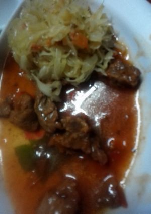 A picture of Stewed beef and saute cabbage.