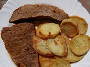 Una foto de tapa de nalga horno