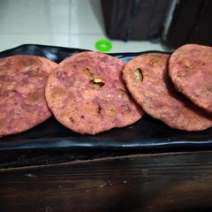 A picture of Beetroot aloo kachori.