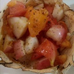 A picture of Tomato onion salad in papad katori.