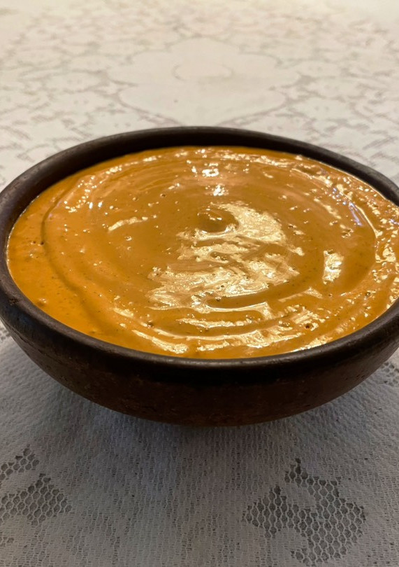 Una foto de Salsa de ají ahumado y queso crema