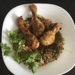 Grilled chicken served with Quinoa A picture of Grilled chicken served with Quinoa.