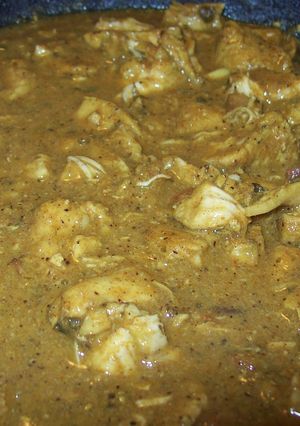 A picture of Kariveppillai Kozhi Kolambu (Curry Leaves Chicken Curry).