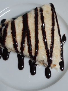 Una foto de Marquesa de coco con topping de chocolate 🥥🍫