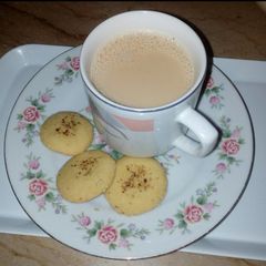 A picture of Tea time with homemade biscuits.