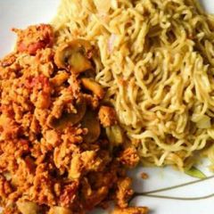 A picture of Noodles with mushroom egg sauce.