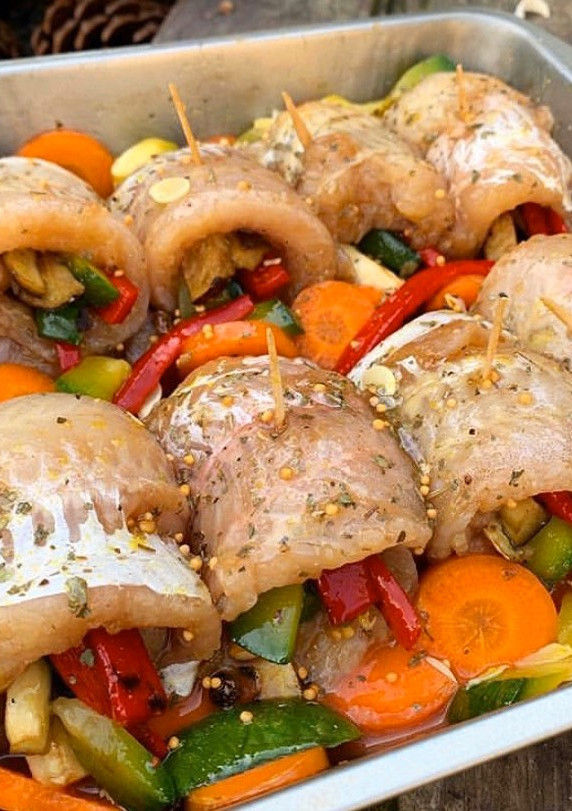 Una foto de Filet de merluza con vegetales