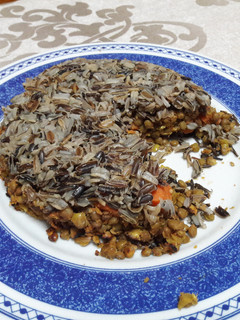 Una foto de 🇵🇪“Arroz tapado peruano” vegano 🍚