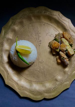 A picture of Begun or Eggplant, Dal Suktoni for lunch in Thakurbari style.