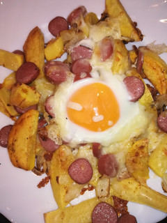 Una foto de Patatas con huevo al horno