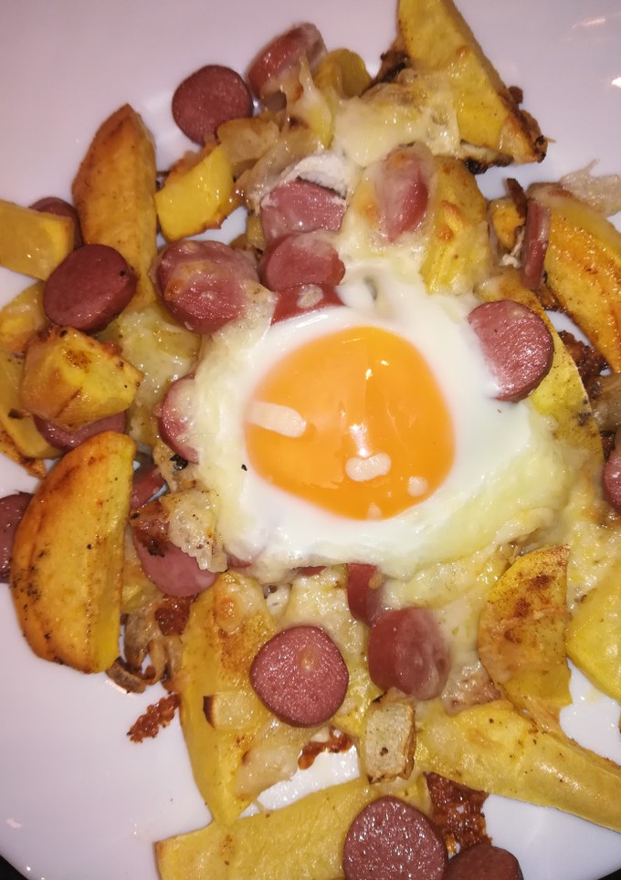 Una foto de Patatas con huevo al horno