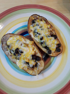 A picture of Black Bean Stuffed Potato Skins.