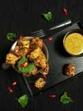 Biuli Dal diye Thankuni Patar Bora (Centella Leaves Pakoras / Fritters)