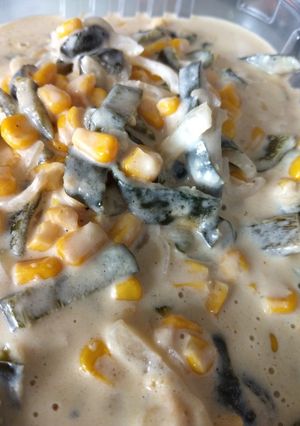 Una foto de Rajitas de poblano con crema