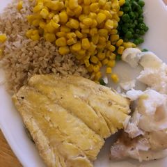 A picture of Double Poached Haddock with veg and rice.