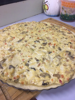 Una foto de Quiche de champiñones, palmitos y jamón
