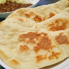 A picture of Easy Homemade Naan Bread (Plain or with Basil).