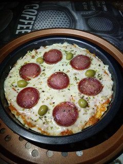 Una foto de Pizza de mandioca