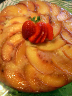 A picture of nectarine sliced cake.