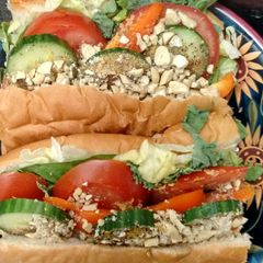A picture of Vegan raw food subs (or salad).