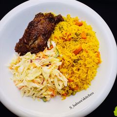 Fried rice with coselow and fried chicken A picture of Fried rice with coselow and fried chicken.