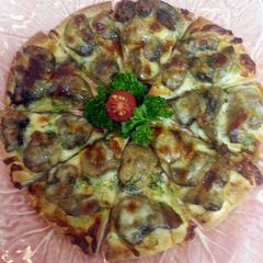 A picture of Herbed Mushroom Mini Pizza Appetizers.