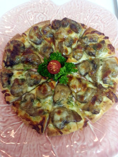 A picture of Herbed Mushroom Mini Pizza Appetizers.
