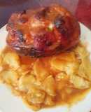 Codillo asado con patatas panaderas