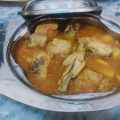 A picture of Potato chicken salan.
