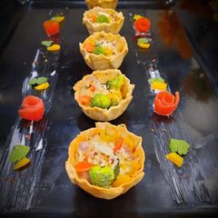 A picture of Cheesy Broccoli Tarts.