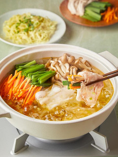 A picture of Vegetable-Wrapped Pork Shabu-Shabu with Green Onion Salt Broth.