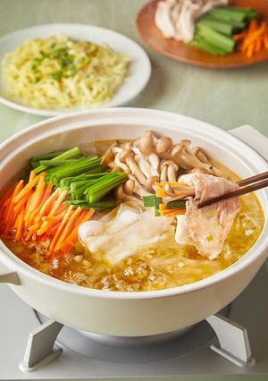 A picture of Vegetable-Wrapped Pork Shabu-Shabu with Green Onion Salt Broth.