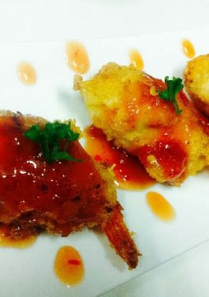 A picture of Kanya's Shrimps wrapped with Chicken and Cheese.