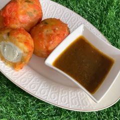 A picture of Stuffed potatoes balls.