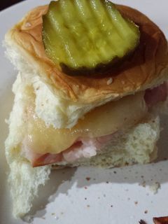 A picture of Ham and white cheddar sliders.