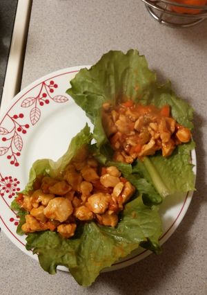 A picture of Honey Sriracha Chicken Lettuce Wrap.